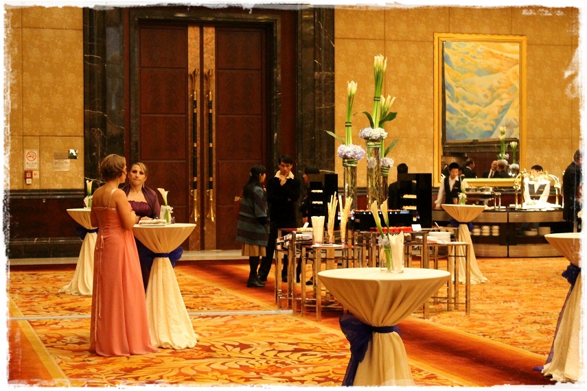 Women in long evening dresses